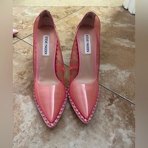 Clear pink pointy toe pumps with gem embellishments